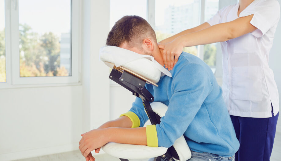 how to improve staff wellbeing with massage on social chair